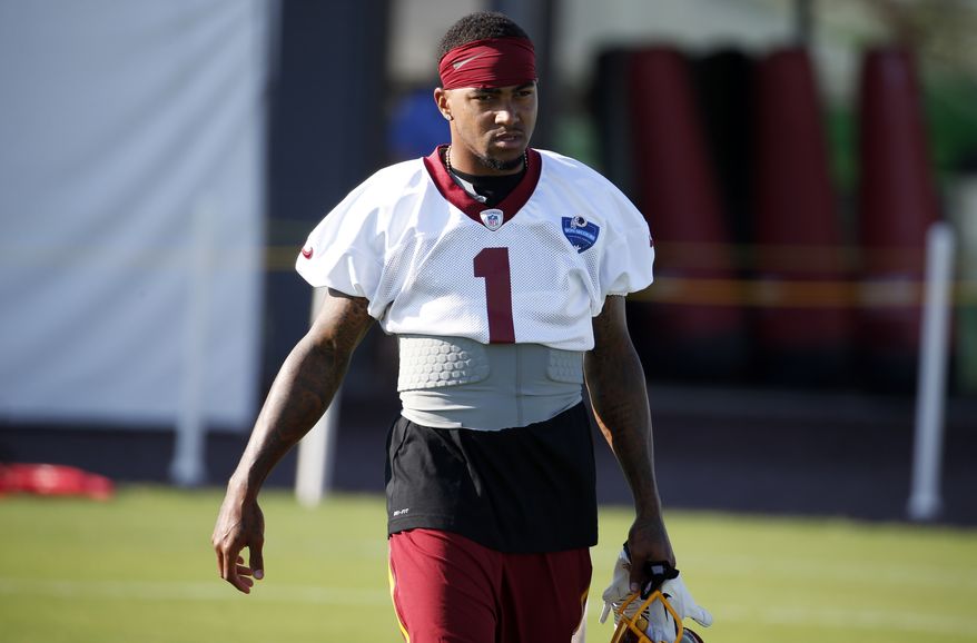 Washington Redskins receiver DeSean Jackson walks on the field for practice at the team's NFL football training facility, Friday, July 25, 2014 in Richmond, Va. (AP Photo)