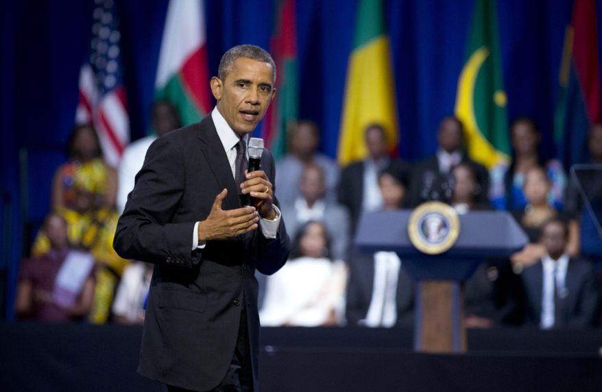 President Barack Obama speaks to participants of the Presidential Summit for the Washington Fellowship for Young African Leaders in Washington, Monday, July 28, 2014, during a town hall meeting. (AP Photo/Manuel Balce Ceneta)