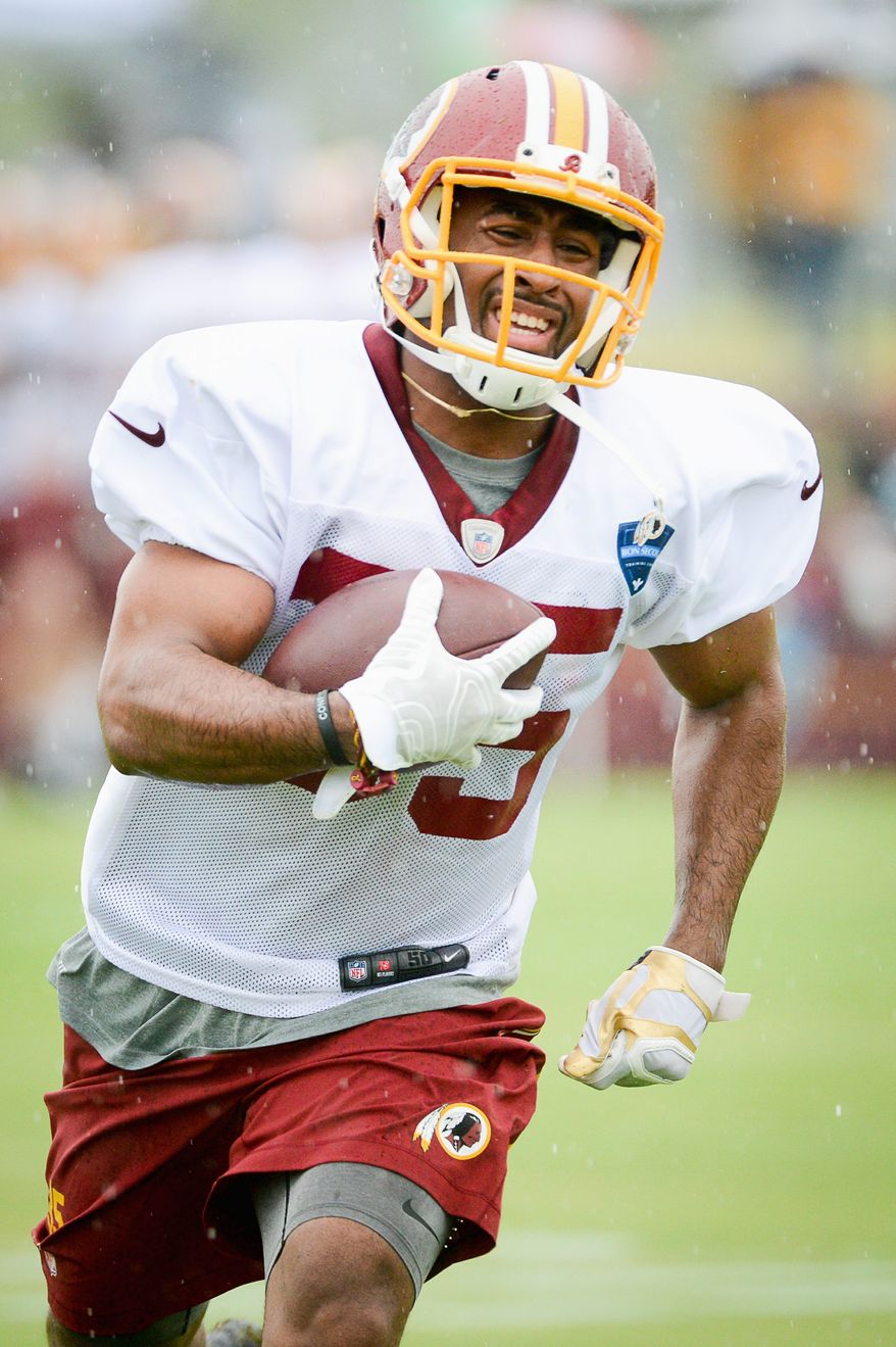 Washington Redskins running back Lache Seastrunk (35) runs a drill on the opening day of Washington Redskins Training Camp at Bon Secours Training Center, Richmond, Va., Thursday, July 24, 2014. (Andrew Harnik/The Washington Times)