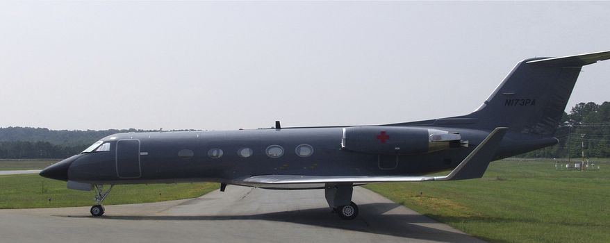 In this undated photo released by the Center for Disease Control, a Gulfsteam airplane modified to carry a Aeromedical Biological Containment System, which looks like a sealed isolation tent for Ebola air transportation, is shown. On Thursday afternoon July 31, 2014, officials at Atlanta's Emory University Hospital said they expected one of the Americans to be transferred there "within the next several days." The hospital declined to identify which aid worker, citing privacy laws. (AP Photo/Center for Disease Control)