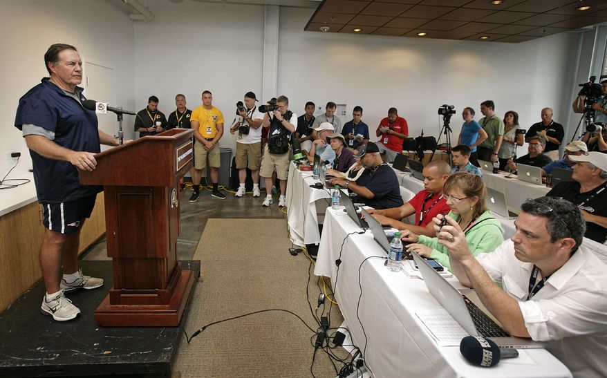 New England Patriots NFL football head coach Bill Belichick speaks at a press conference at a joint New England Patriots and Washington Redskins practice in Richmond, Va., Monday, Aug. 4, 2014. (AP Photo/Jay Paul)
