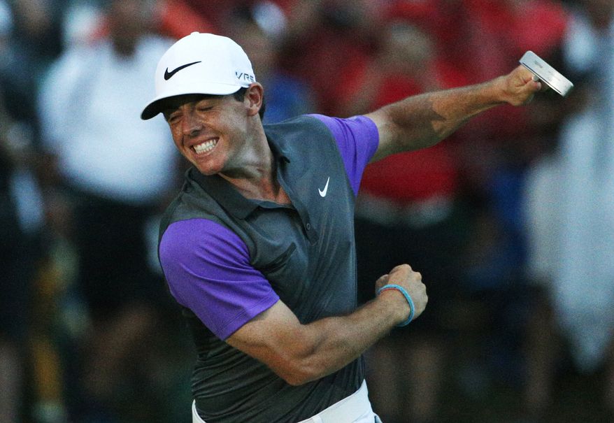 Rory McIlroy, of Northern Ireland, celebrates after winning the PGA Championship golf tournament at Valhalla Golf Club on Sunday, Aug. 10, 2014, in Louisville, Ky. (AP Photo/Mike Groll)