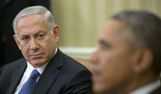 Israeli Prime Minister Benjamin Netanyahu listens as President Barack Obama speaks in the Oval Office of the White House Oct. 1, 2014. The two leaders have long had a prickly relationship. (AP Photo/Pablo Martinez Monsivais)