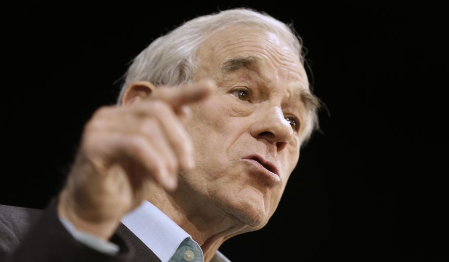 Former Texas Rep. Ron Paul, father of Sen. Rand Paul, R-Ky., speaks in Richmond, Va., in this Nov. 4, 2013, file photo. (AP Photo/Steve Helber, File)