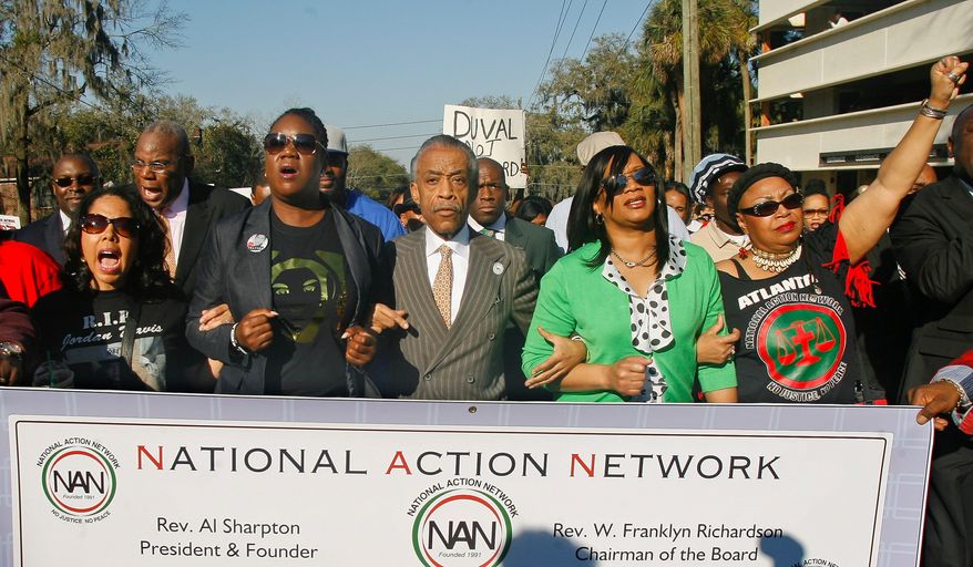 From left, participants including Lucia McBath, mother of Jordan Davis, Sybrina Fulton, mother of Trayvon Martin, Rev. Al Sharpton, president of National Action Network, and Phyllis Giles, mother of Michael Giles, march to the Florida Capitol Monday, March 10, 2014, in Tallahassee, Fla. Participants were rallying against the state&#39;s &quot;Stand Your Ground&quot; laws. (AP Photo/Phil Sears)