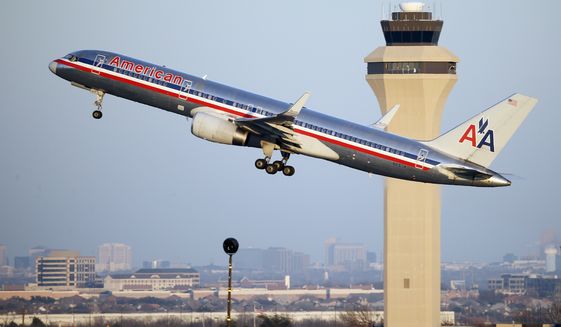 In this Jan. 15, 2015, photo, an American Airlines aircraft takes off from Dallas-Fort Worth International Airport, in Grapevine, Texas. (AP Photo/Tony Gutierrez) ** FILE **