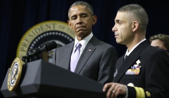 President Barack Obama listens as he is introduced by Rear Adm. Scott Giberson, Assistant U.S. Surgeon General and Public Health Service (PHS) Commander of Commissioned Corps Ebola Response in West Africa, before speaking about the Ebola outbreak response by the U.S. in West Africa, Wednesday, Feb. 11, 2015, in the South Court Auditorium of the White House complex in Washington. Obama plans to withdraw most US military troops fighting Ebola outbreak in West Africa. (AP Photo/Jacquelyn Martin) **FILE**