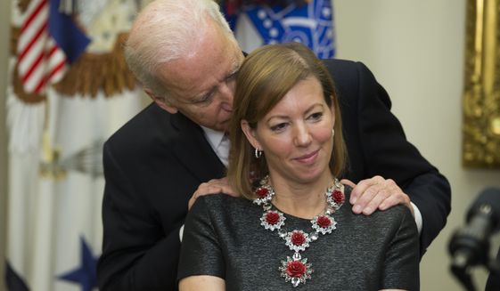 What’s a little flirting among friends? Ash Carter ‘laughed’ at Biden rubbing his wife Obama-defense-secretaryjpeg-09dbb_c0-196-4661-2912_s561x327