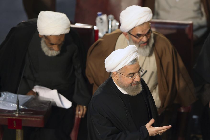 Iranian President Hassan Rouhani, who is also a member of the Assembly of Experts, arrives to attend a biannual meeting of the assembly in Tehran, Iran, Tuesday, March 10, 2015. Iran&#39;s most influential clerical body charged with choosing or dismissing the nation&#39;s supreme leader has elected a hard-line ayatollah as its new chairman, the official IRNA news agency reported on Tuesday. IRNA said Mohammad Yazdi, the deputy chairman of the 86-member Assembly of Experts, got 47 votes in his favor from among 73 clerics who attended the session. (AP Photo/Vahid Salemi)