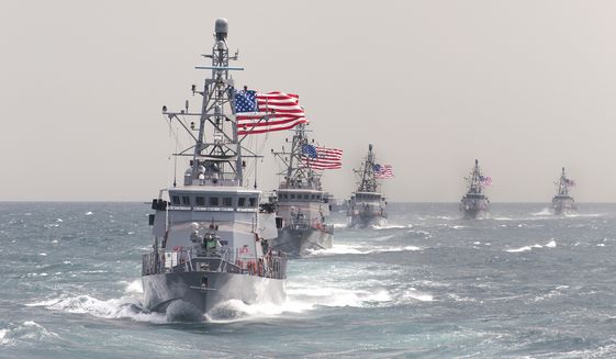 U.S. 5TH FLEET AREA OF RESPONSIBILITY (March 17, 2014) The Cyclone-class coastal patrol ship USS Hurricane (PC 3) leads other coastal patrol ships assigned to Patrol Coastal Squadron 1 (PCRON 1) in formation during a divisional tactics exercise. U.S. Navy photo.