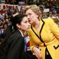Huma Abedin, who has been at Hillary Rodham Clinton's side as her personal assistant or &quot;body woman&quot; since the 2008 presidential race, faced criticism for standing by her husband, former Rep. Anthony Weiner, after sexting scandals that damaged his political career. She now has to defend her own actions with the Clinton Foundation and the State Department email scandal. (Associated Press) ** FILE **