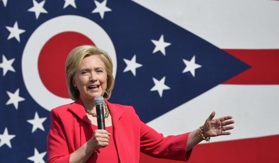 Democratic presidential candidate Hillary Rodham Clinton speaks on the campus of Case Western Reserve University in Cleveland, Thursday, Aug. 27, 2015, during a &#39;Commit to Vote&#39; grassroots organizing meeting. (AP Photo/David Richard)