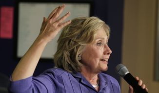 Democratic presidential candidate Hillary Rodham Clinton speaks during a campaign stop at Uncle Nancy's Coffee House, Sunday, Sept. 6, 2015, in Newton, Iowa. (AP Photo/Charlie Neibergall)