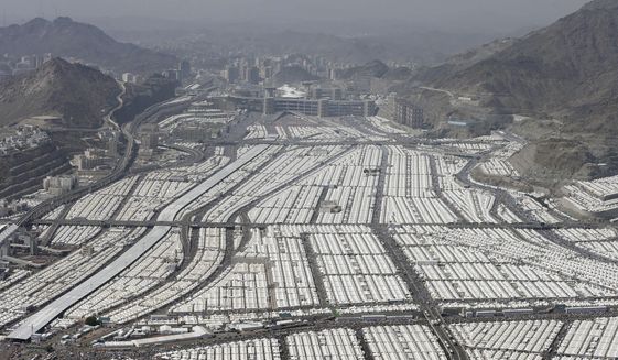 This aerial image made from a helicopter shows thousands of tents housing Muslim pilgrims crowded together in Mina, during the annual Hajj in the Saudi holy city of Mecca, Saudi Arabia, on Oct. 27, 2012. (Associated Press) **FILE**