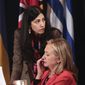 Huma Abedin, deputy chief of staff and aide to Secretary of State Hillary Rodham Clinton, wife of former New York Rep. Anthony Weiner, rear, is seen during the Open Government Partnership meeting in New York, Tuesday, Sept., 20, 2011. (AP Photo/Pablo Martinez Monsivais)