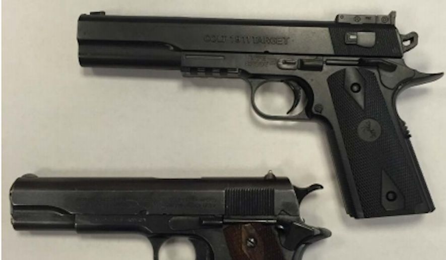 The toy pellet gun (top right) used by 12-year-old Tamir Rice when he was shot and killed by police in Cleveland in Nov. 2014 is pictured beside a real gun. (Image: Cuyahoga County Prosecutor&#39;s Office)