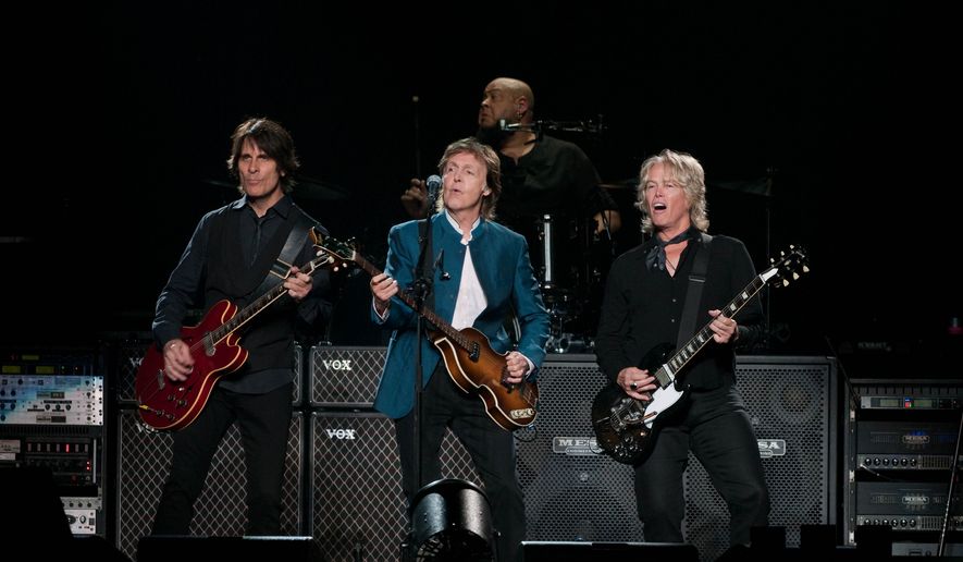 Paul McCartney performs with his band at Verizon Center.  (Erica Bruce)