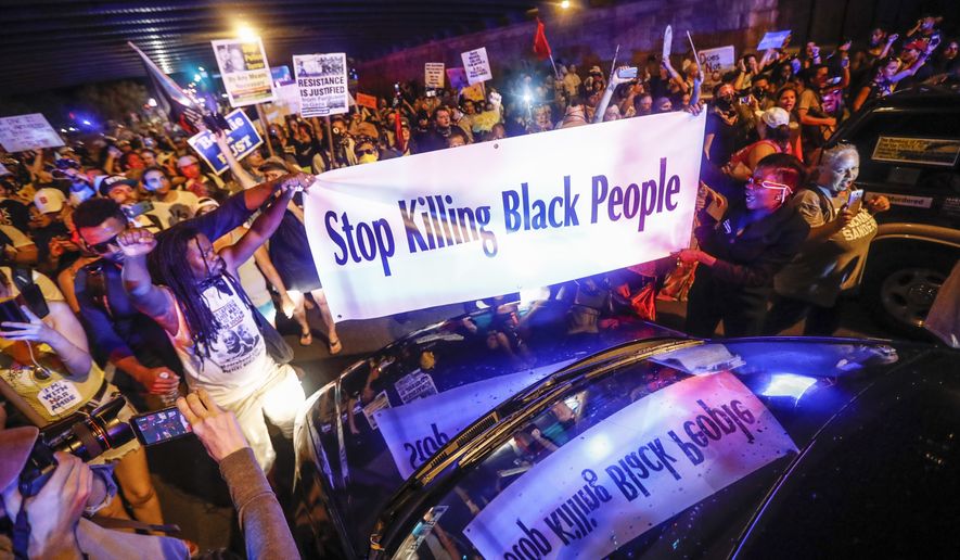 Black Lives Matter demonstrators gather during a protest on Broad Street in Philadelphia on July 26, 2016, during the second day of the Democratic National Convention. (Associated Press)