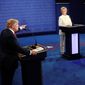 Donald Trump gestures toward Hillary Clinton during the third presidential debate Wednesday in Las Vegas. (Associated Press) ** FILE **