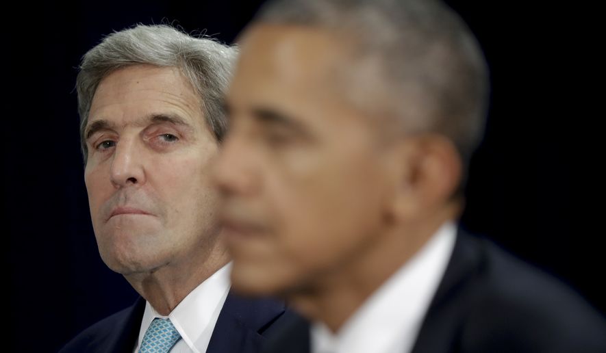 Secretary of State John Kerry looks toward President Barack Obama during a bilateral meeting with Nigerian President Muhammadu Buhari on the margins of 71st session of the United Nations General Assembly, Tuesday, Sept. 20, 2016. (AP Photo/Carolyn Kaster)