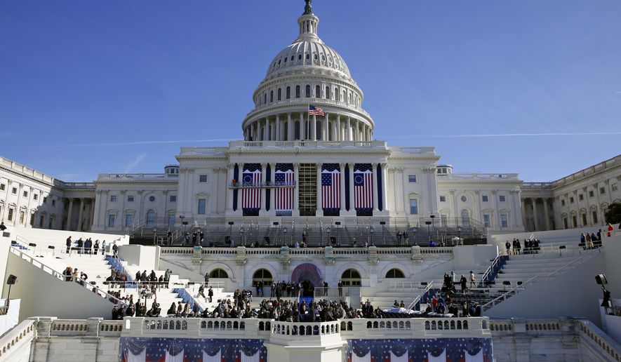 The U.S. Capitol looms over a stage during a rehearsal of President-elect Donald Trump&#39;s swearing-in ceremony, Sunday, Jan. 15, 2017, in Washington. (AP Photo/Patrick Semansky)