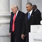 President Donald Trump walks with former President Barack Obama on Capitol Hill in Washington, Friday, Jan. 20, 2017, prior to Obama's departure from the 2017 Presidential Inauguration. (Jack Gruber/Pool Photo via AP)
