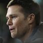 New England Patriots' Tom Brady answers questions during opening night for the NFL Super Bowl 51 football game at Minute Maid Park Monday, Jan. 30, 2017, in Houston. (AP Photo/Charlie Riedel)