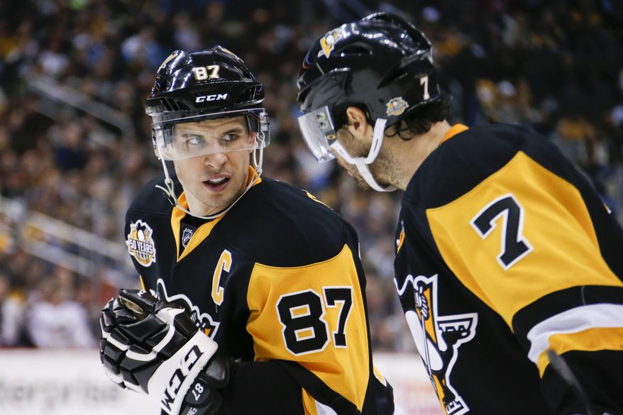 In this Friday, Feb. 3, 2017, photo, Pittsburgh Penguins' Sidney Crosby (87) prepares for a face-off during the second period of an NHL hockey game against the Columbus Blue Jackets in Pittsburgh. On the verge of 1,000 career points - a milestone that once seemed a foregone conclusion - Sidney Crosby's star is burning as bright as ever. Yet it's not a moment the Pittsburgh Penguins center takes for granted. The two-time MVP still holds close those lonely days of 2011-12 when he wondered if his frustratingly slow recovery from a concussion would ever end. (AP Photo/Gene J. Puskar)