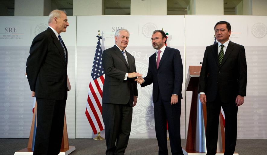 Secretary of State Rex W. Tillerson (center left) met Mexican Foreign Relations Secretary Luis Videgaray (center right) to discuss a range of issues including the southwest border and trade. Both sides say the meeting was productive, though Mr. Videgaray said the chasm between the two sides on some issues remains great. (Associated Press)