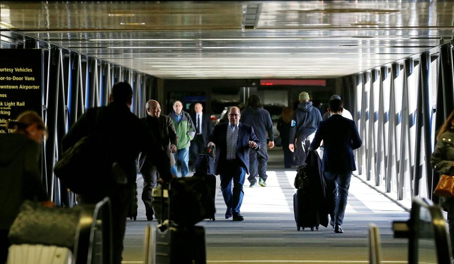 Airport officials and civil rights lawyers across the U.S. are getting ready to face President Trump&#39;s latest travel ban, which no longer affects Iraqi visitors. (Associated Press)