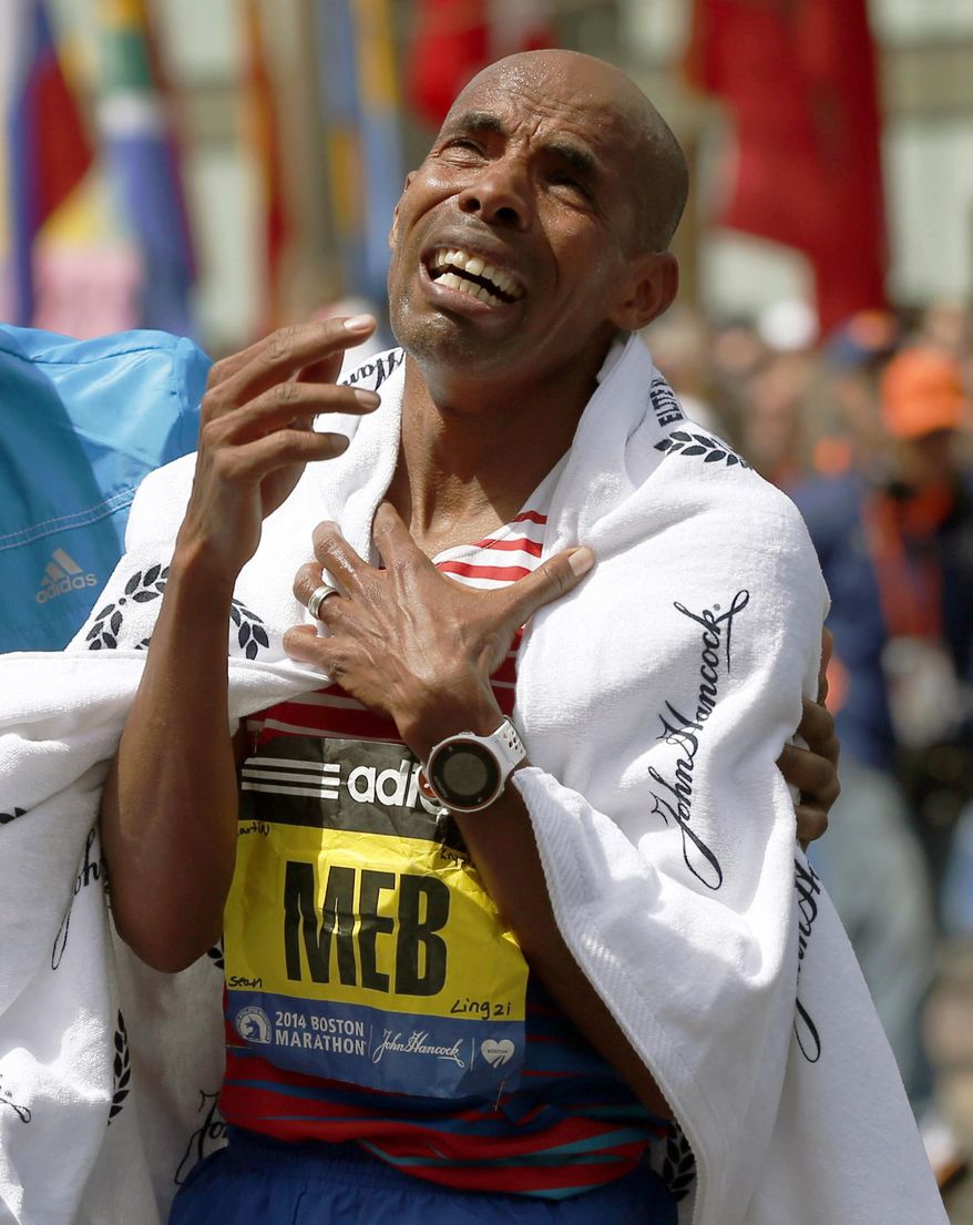 FILE - In this April 21, 2014, file photo, Meb Keflezighi, of San Diego, becomes emotional after winning the 118th Boston Marathon in Boston. Keflezighi was born in Eritrea, but his family fled the Horn of Africa&#39;s war and poverty and eventually settled in San Diego. A U.S. citizen, he was a high school standout who went on to break records at UCLA and win four NCAA titles before turning pro in 1998. Keflezighi said he&#39;ll hang up his racing shoes for good after running the April 17, 2017, Boston Marathon and the TCS New York City Marathon in November. (AP Photo/Elise Amendola, File)