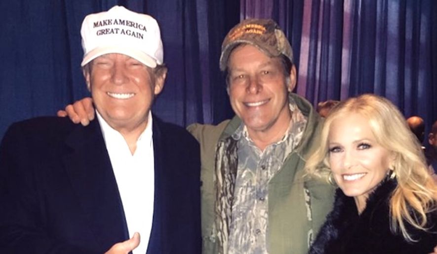 Legendary rock musician Ted Nugent and his wife, Shemane, pose with President Donald Trump. (Twitter, Ted Nugent) ** FILE **