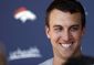 broncos_jostling_qbs_football_52811.jpg