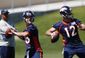 broncos_jostling_qbs_football_66258.jpg