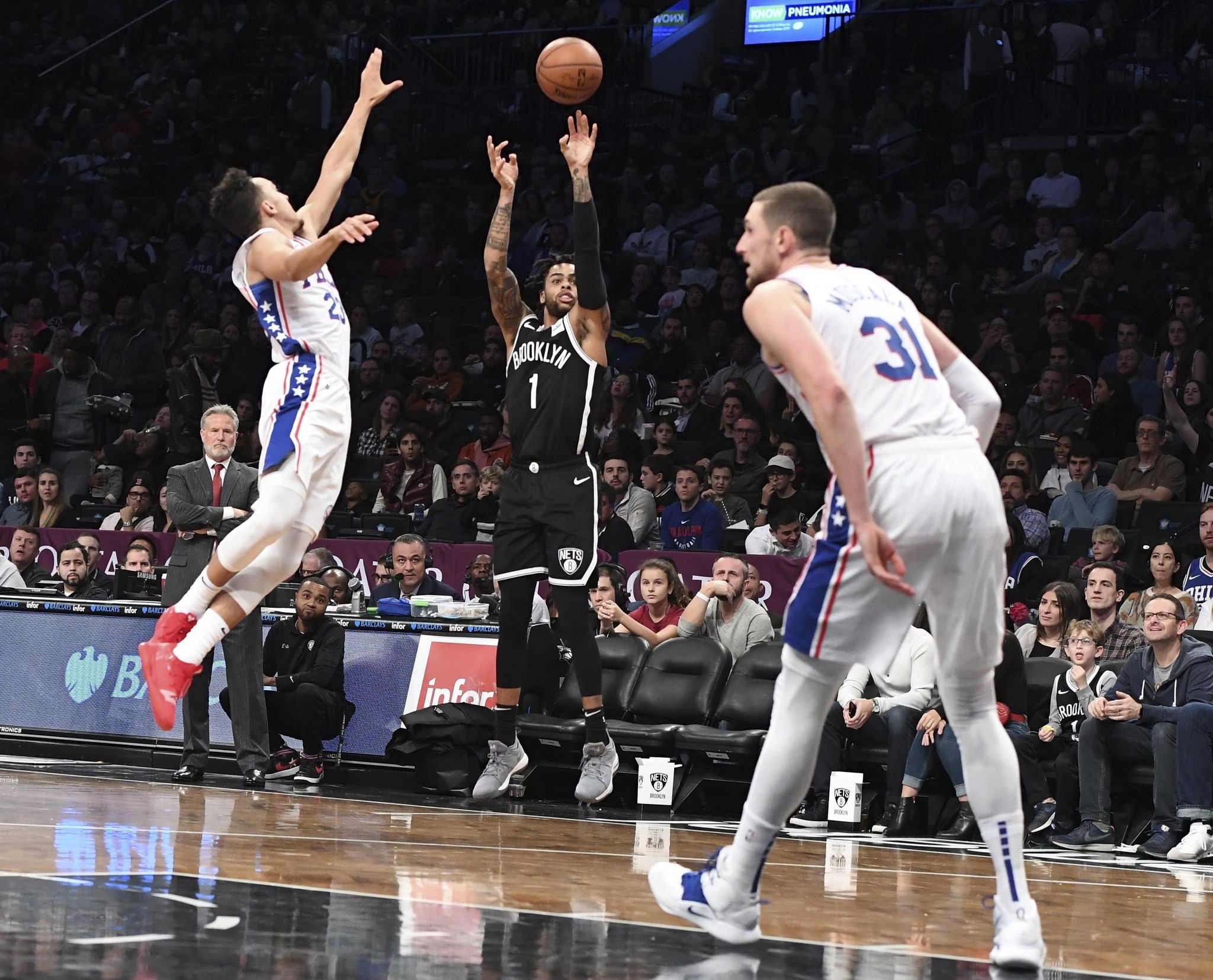 Russell scores 21, Nets defeat sloppy Sixers 122-97