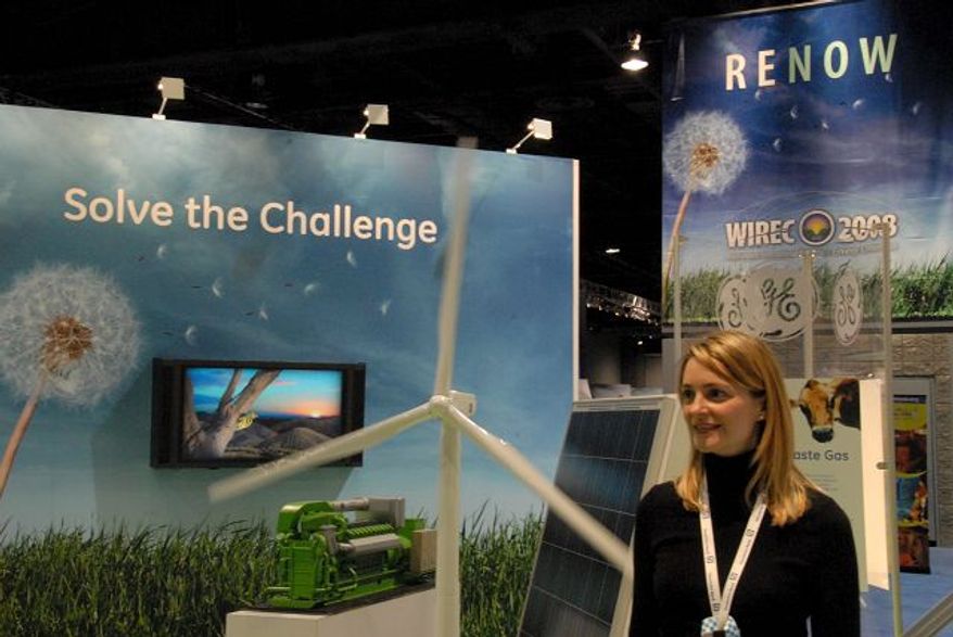 Christa Bowers, of Greenhouse Gas Services, explained wind power yesterday at the Washington International Renewable Energy Conference. (Tom Ramstack/The Washington Times)