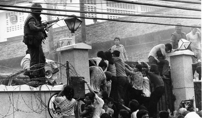 Above: Mobs scale the wall of the U.S. Embassy in Saigon, Vietnam, in April 1975 to escape the imminent communist takeover. Left: In April 1956, black and white passengers sit segregated on a trolley in Atlanta, despite a Supreme Court decision. Both were pivot points in U.S. history.