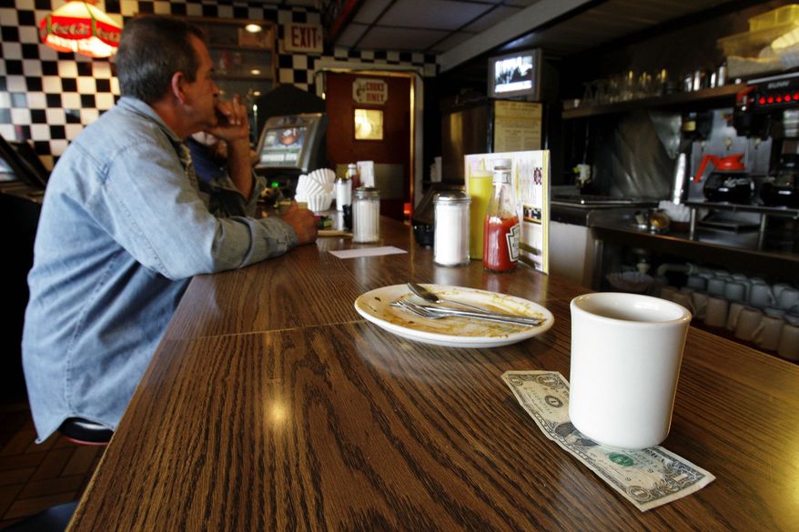 **FILE** A tip is left by a customer at Linda's Place Restaurant in St. Clair Shores, Mich., on June 19, 2008. (Associated Press)