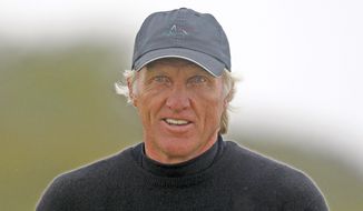 Agence France-Presse / Getty Images
Greg Norman, a two-time British Open champion, is within a stroke of the lead after the first round at Royal Birkdale.