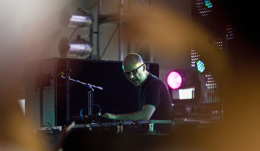 Musician Moby plays a DJ set at the Dance Tent during the Virgin Mobile Festival on August 10, 2008. (John Tully/The Washington Times)