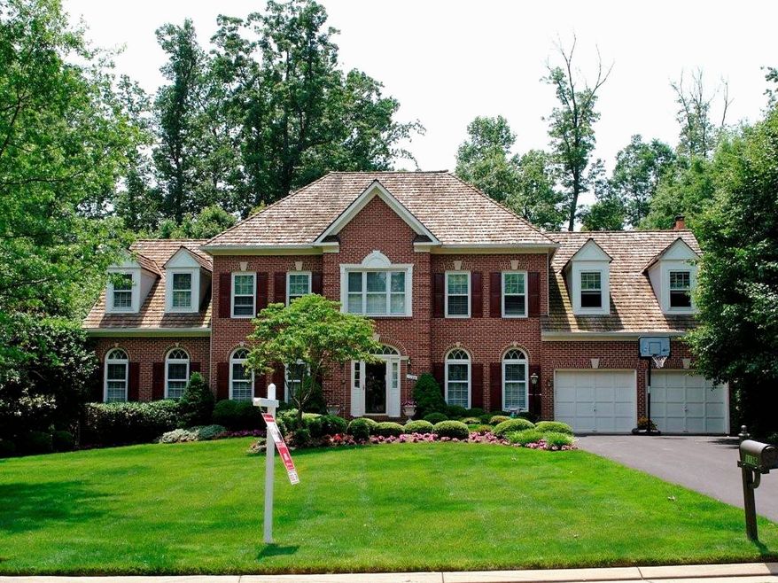 The half-acre lot at 1136 Round Pebble Lane in Reston has enough space for the garden, hot tub and swimming pool, along with an extensive main-level deck with space for dining and seating areas. The home has 5,669 finished square feet.