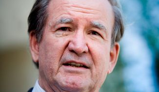 Pat Buchanan, portrayed as anti-Israel, is being used by both Democrats and Republicans to try to win the Jewish vote in the presidential election. (Getty Images)