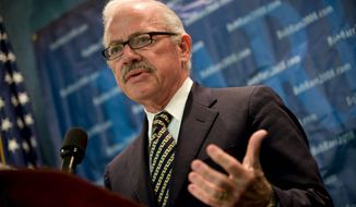 Former Republican Rep. Bob Barr of Georgia has sent a letter to Attorney General Eric H. Holder Jr. urging him to back off his attempt to restore the so-called &quot;assault weapons&quot; ban of 1994. (Agence France-Presse/Getty Images)