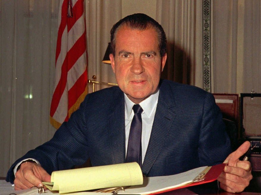 **FILE** President Richard M. Nixon is shown at his desk in the White House on Feb. 16, 1969. On Aug. 9, 1974, Nixon would go down in history as the only U.S. president to resign. (Associated Press)
