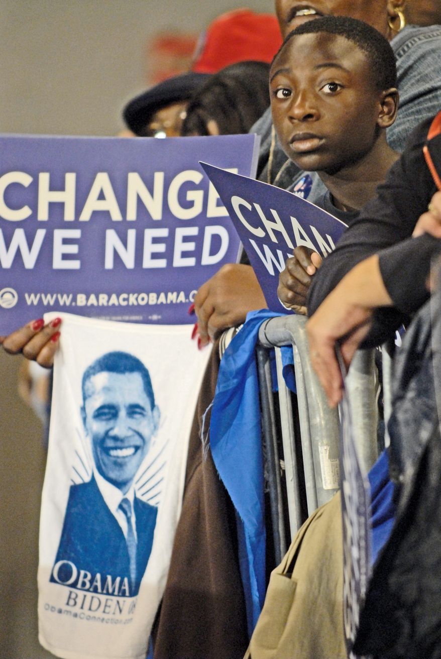 A young man waits for the arrival of Democratic presidential candidate Barack Obama at a campaign rally at the Roanoke Civic Center in Virginia on Oct. 17, 2008. (J.M. Eddins Jr./The Washington Times) **FILE**