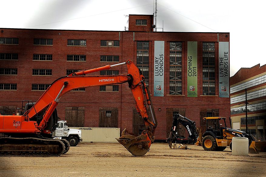 **FILE** Luxury condominiums construction near Nationals Park. (Barbara L. Salisbury/The Washington Times)