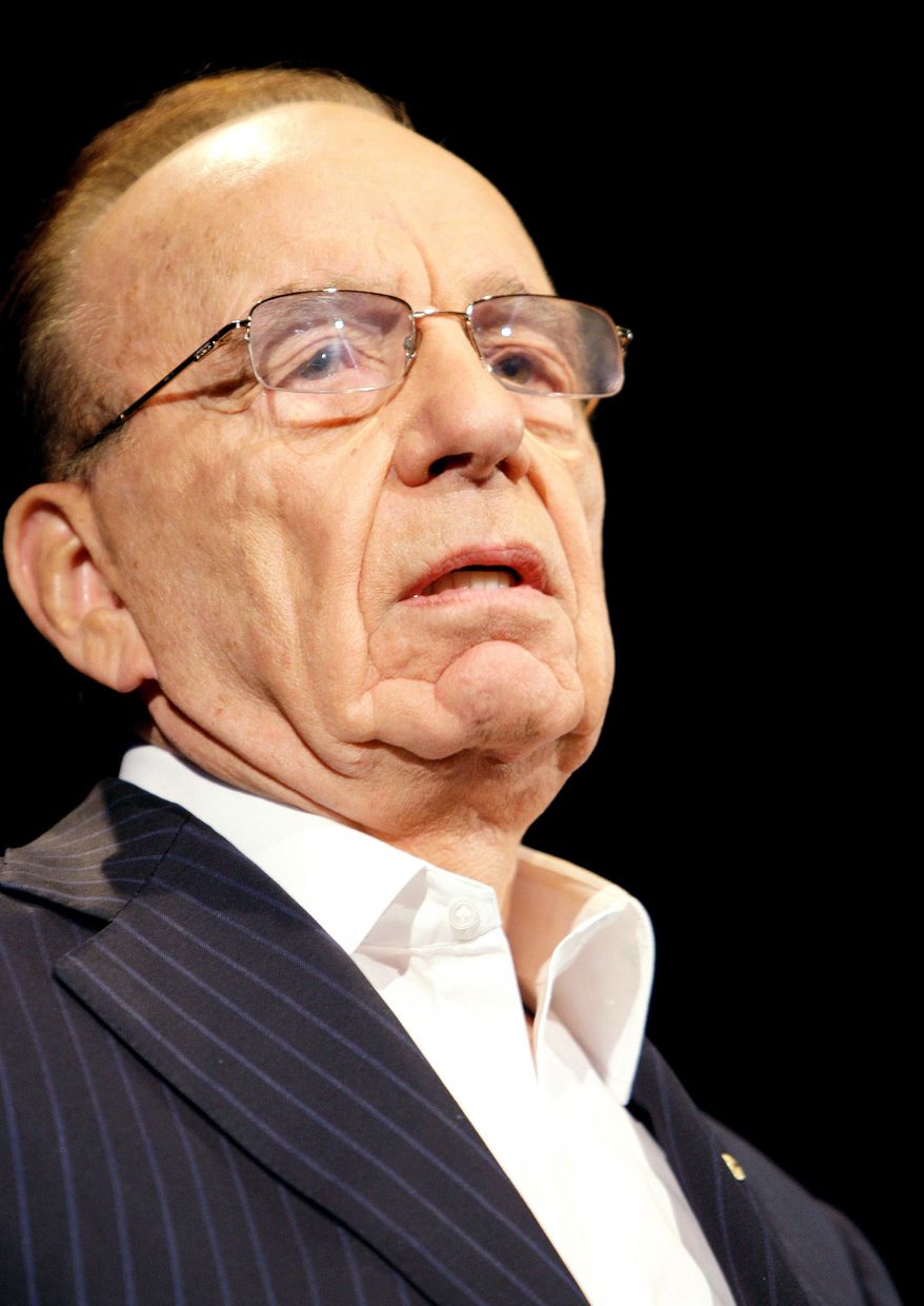 ASSOCIATED PRESS
Doomsayers predicting the Internet will kill newspapers are "misguided cynics," says media mogul Rupert Murdoch, chairman of News Corp.