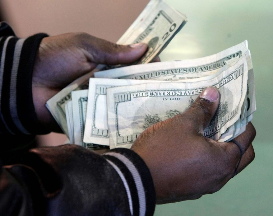 *FILE* U.S. dollars. April 5, 2009