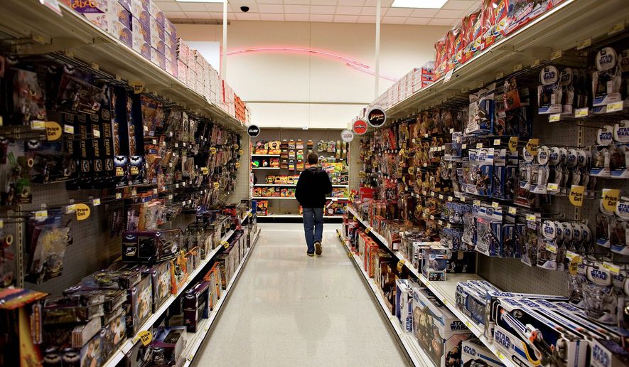A customer browses an aisle of toys in a Super Target store. (Bloomberg News)