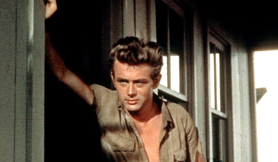 Actor James Dean, shown in a scene from the 1956 movie &quot;Giant,&quot; exemplified the bad-boy persona. (Associated Press)